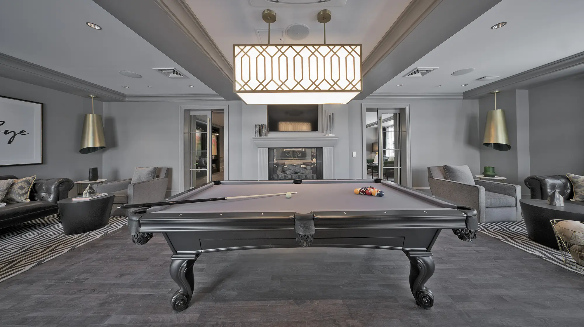 Clubhouse with lounge seating, pool table, and tv